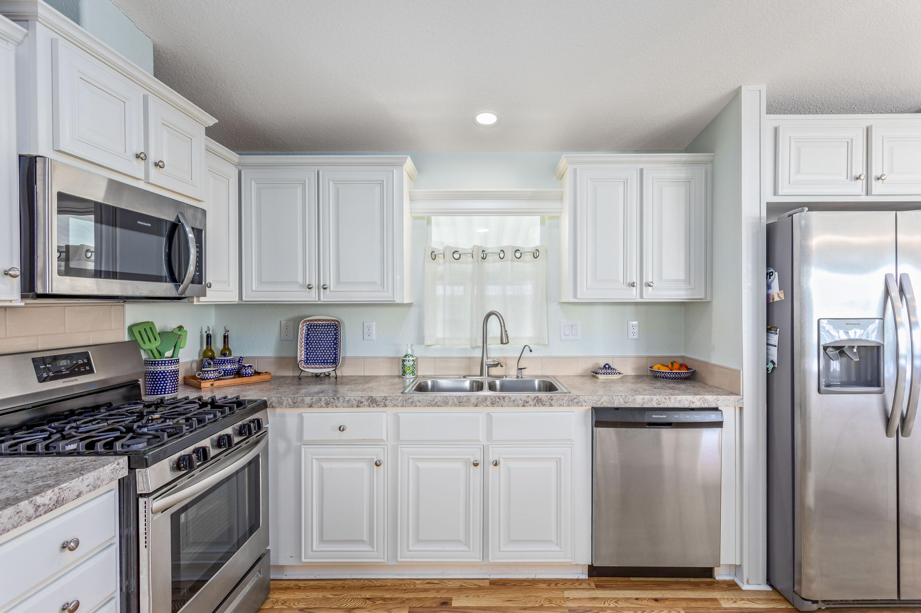 333 Old Mill Road, Unit SPC 66 Santa Barbara, CA 93110 - Photo 9 of 33 a kitchen with stainless steel appliances granite countertop a stove a sink and a refrigerator