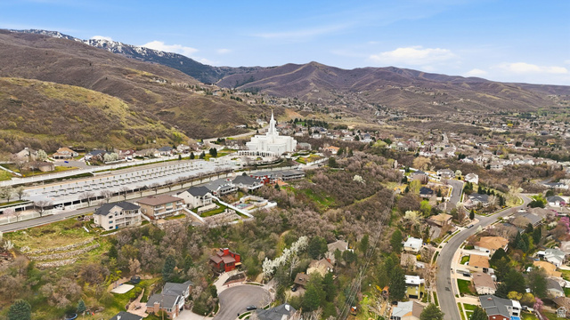 331 South 1550th Street East, Unit 3 Bountiful, UT 84010 - Photo 12 of 30 Aerial view of residential area with a mountainous background