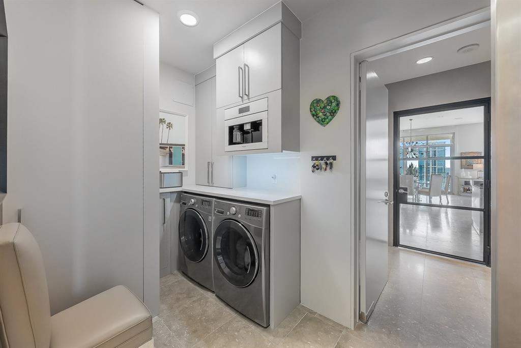 1717 Arts Plaza, Unit 1915 Dallas, TX 75201 - Photo 12 of 31 a storage room with washer and dryer