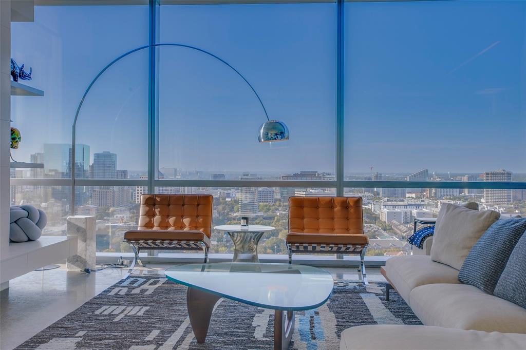 1717 Arts Plaza, Unit 1915 Dallas, TX 75201 - Photo 13 of 31 a living room with furniture and a flat screen tv