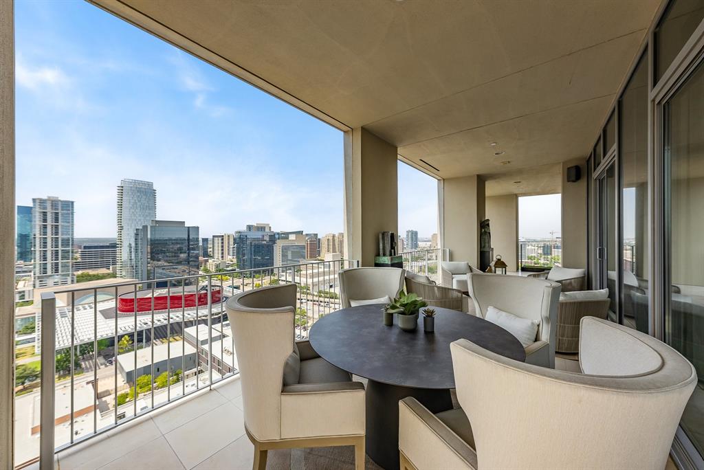1717 Arts Plaza, Unit 1915 Dallas, TX 75201 - Photo 17 of 31 a view of a dining room with furniture window and outside view