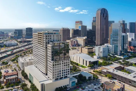 a city view with tall buildings