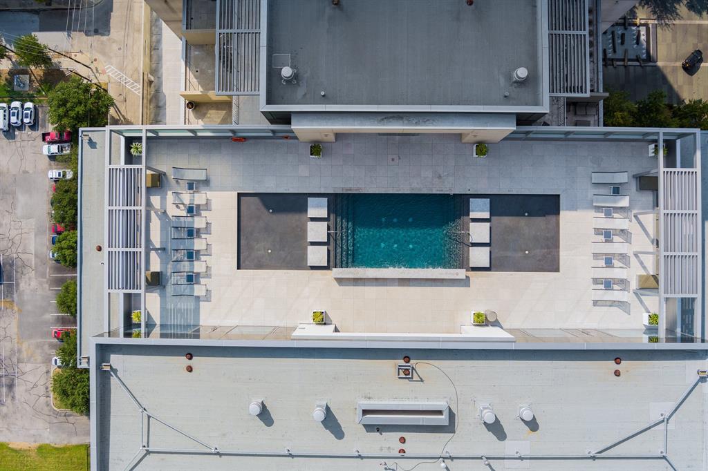 1717 Arts Plaza, Unit 1915 Dallas, TX 75201 - Photo 30 of 31 a bathroom with a sink and a mirror