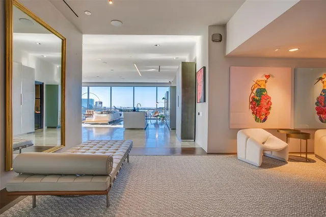 a living room with furniture and a table