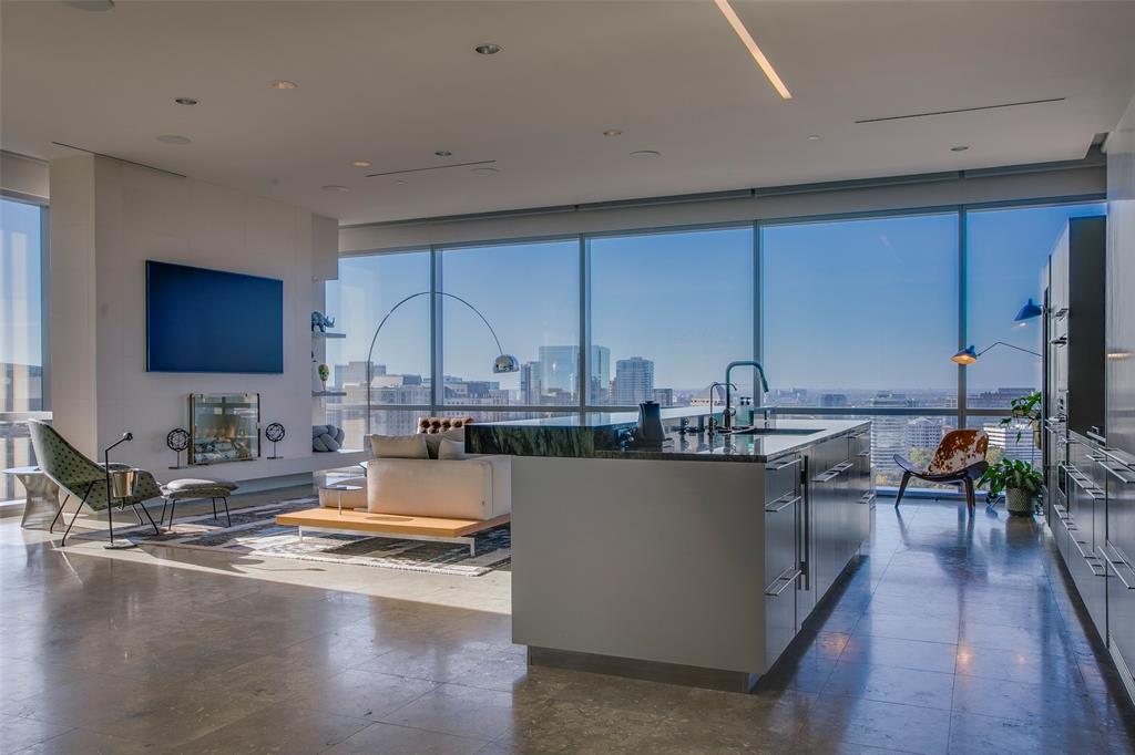 1717 Arts Plaza, Unit 1915 Dallas, TX 75201 - Photo 6 of 31 a kitchen with sink and cabinets