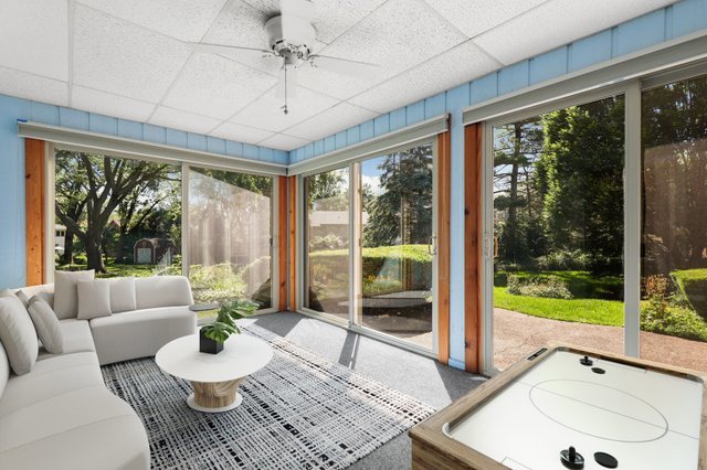 808 Burning Tree Lane Naperville, IL 60563 - Photo 14 of 34 a living room with furniture and a large window