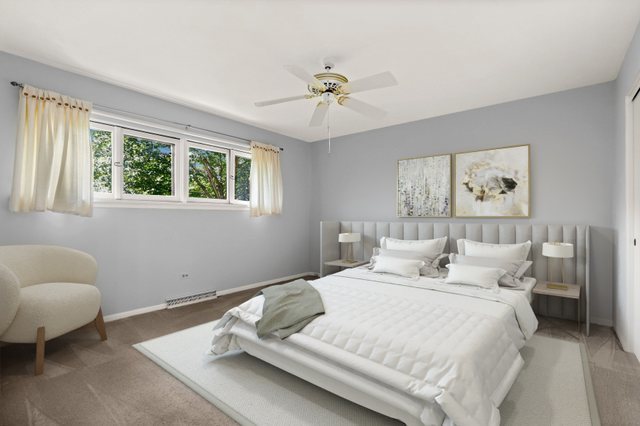 808 Burning Tree Lane Naperville, IL 60563 - Photo 17 of 34 a bedroom with a bed and a couch