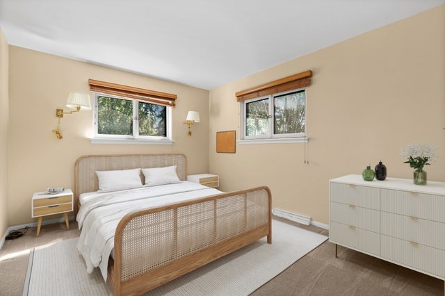 808 Burning Tree Lane Naperville, IL 60563 - Photo 21 of 34 a bedroom with a bed and a table