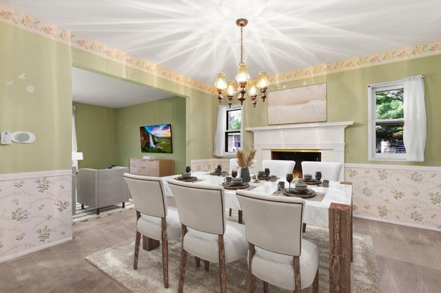 808 Burning Tree Lane Naperville, IL 60563 - Photo 6 of 34 a view of a dining room with furniture and a chandelier