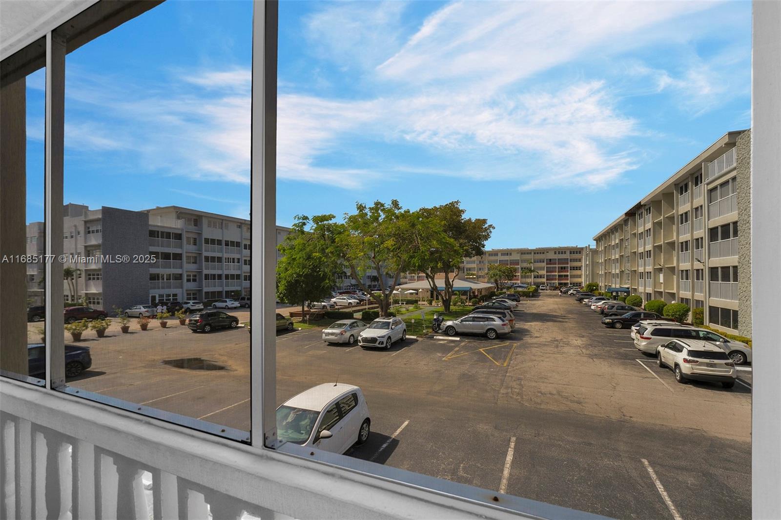 410 Southeast 2nd Street, Unit 220 Hallandale Beach, FL 33009 - Photo 20 of 25 a view of a street with cars