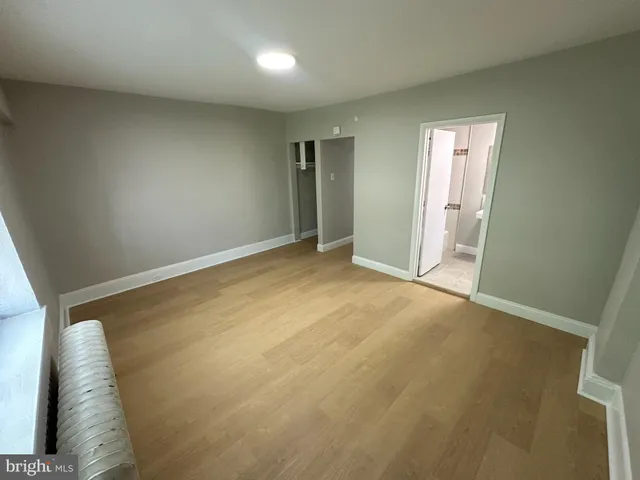 an empty room with closet