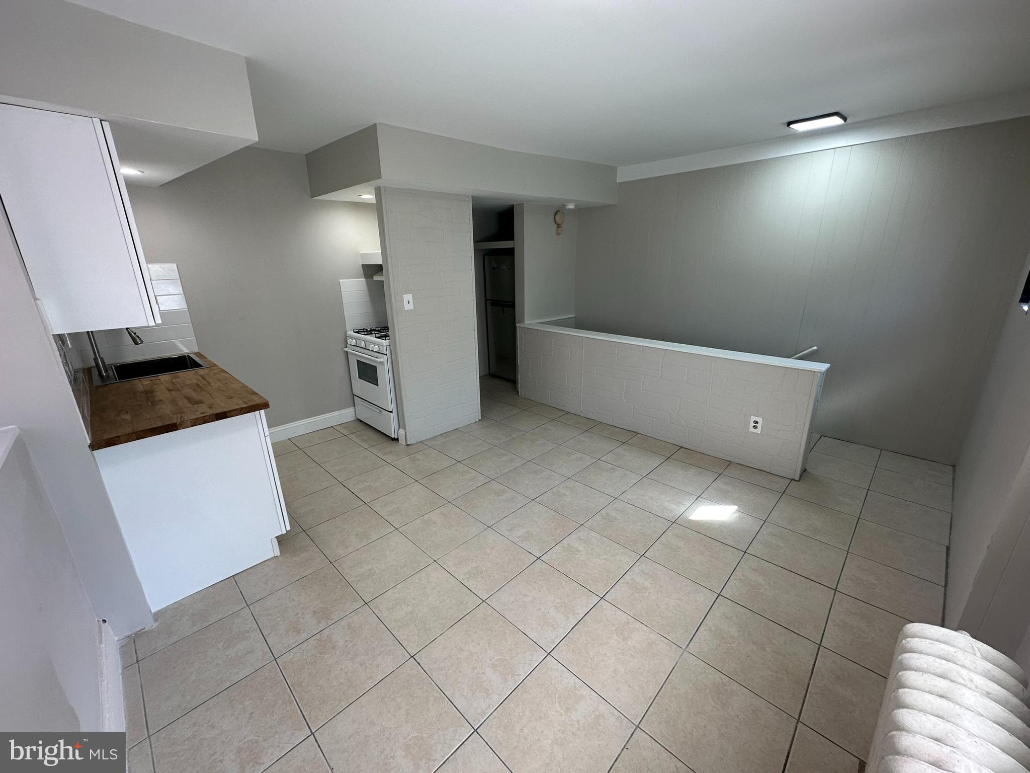 7028 Paschall Avenue Philadelphia, PA 19142 - Photo 3 of 21 a view of an empty room and window