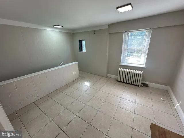 a view of an empty room with window