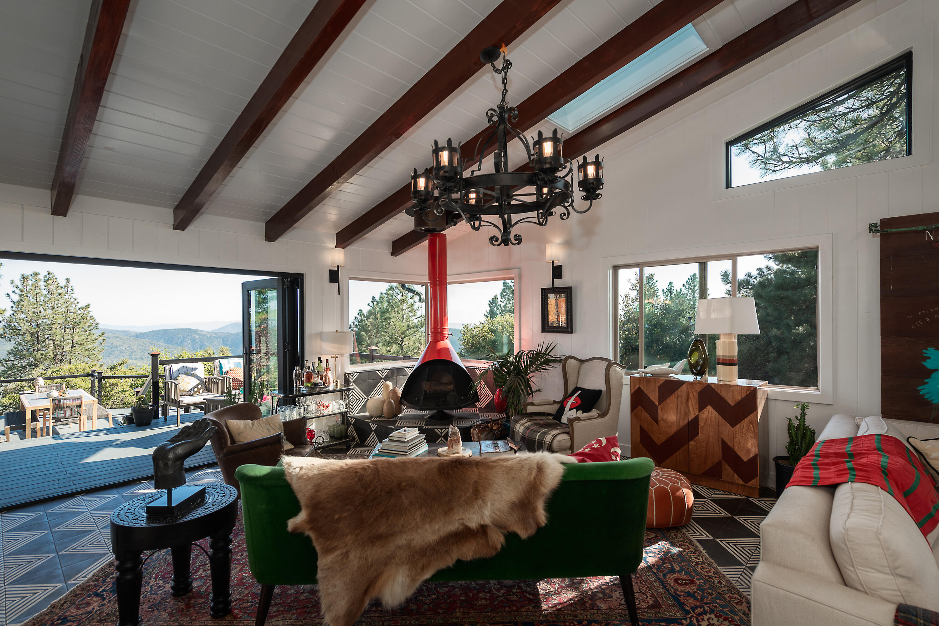 52421 Double View Drive Idyllwild, CA 92549 - Photo 25 of 73 a living room with patio furniture and a large window