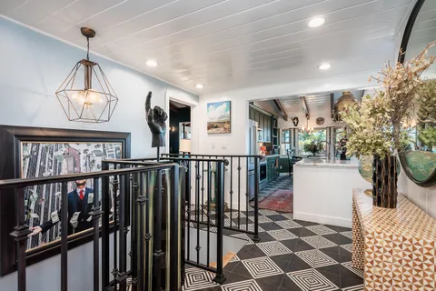 a bed room with a bed and a lamp