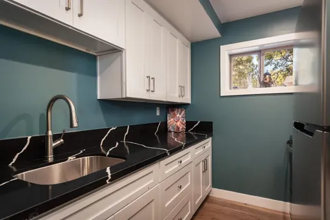 a view of a balcony with chairs