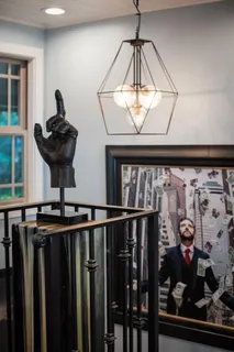 a bed room with a bed and a television