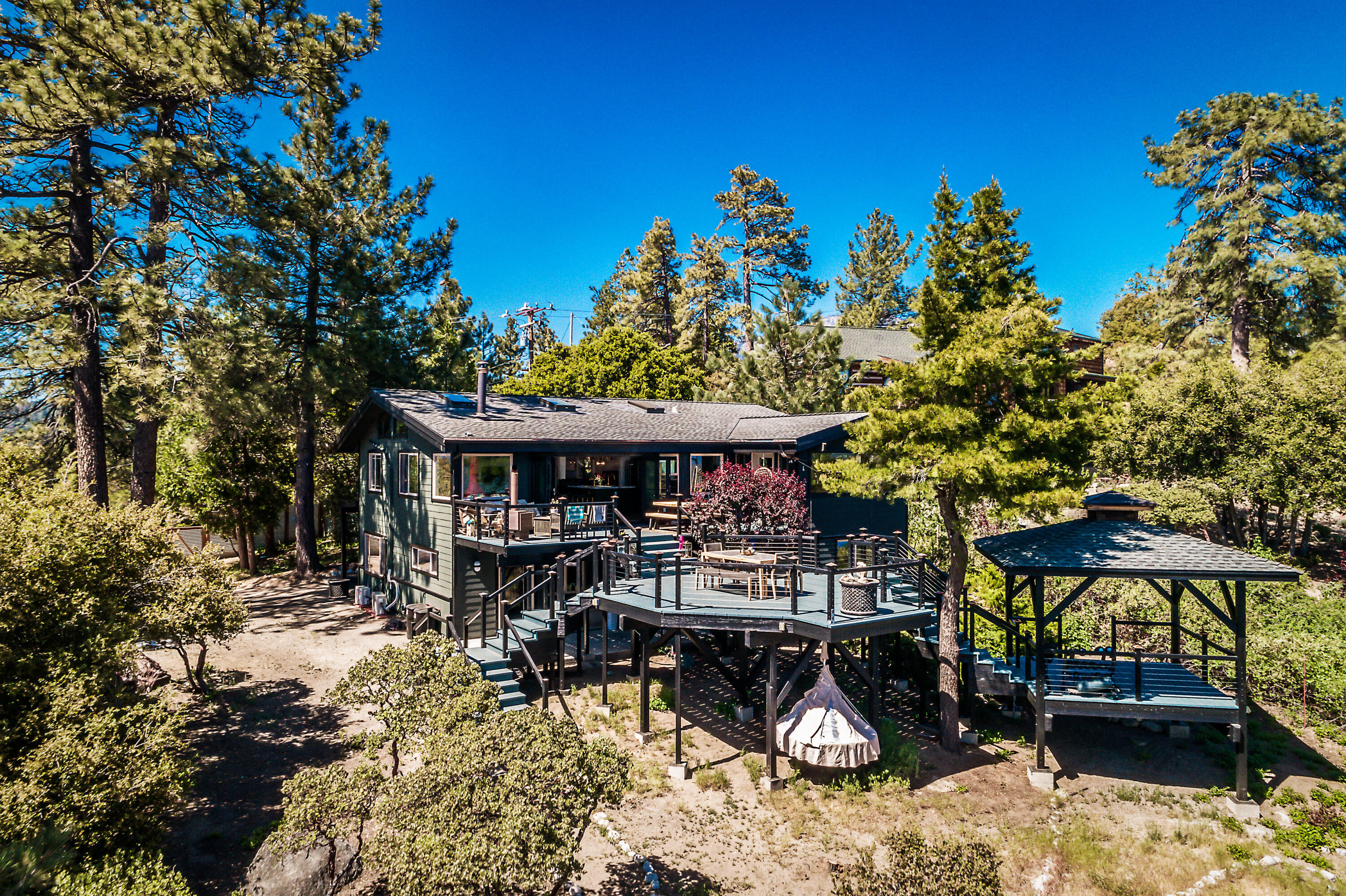 52421 Double View Drive Idyllwild, CA 92549 - Photo 73 of 73 a view of a chairs and table in backyard