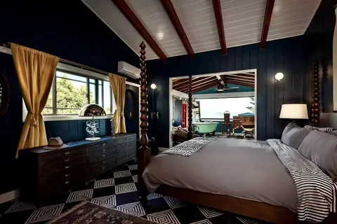 a room with furniture and a large window