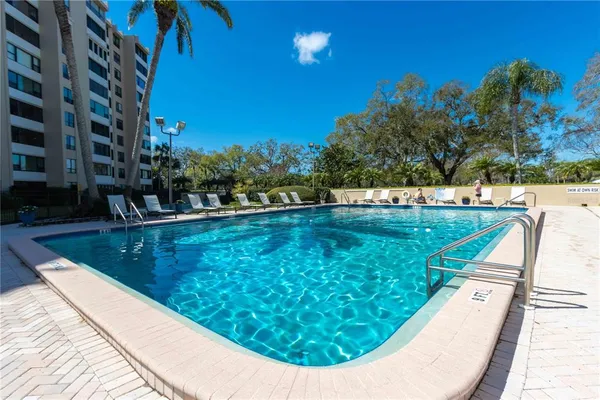 a street sign on a pole on a street