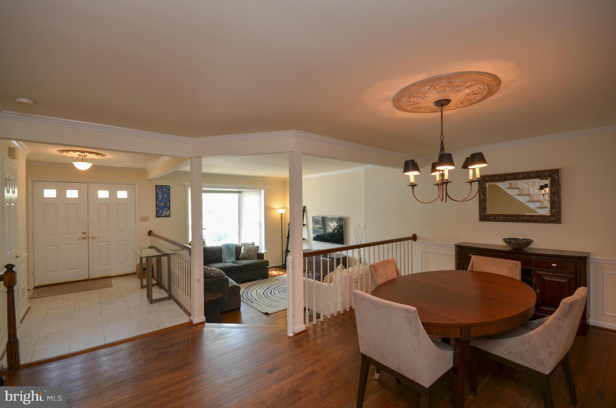 10771 Brewer House Road Rockville, MD 20852 - Photo 2 of 30 a view of a dining room with furniture and wooden floor