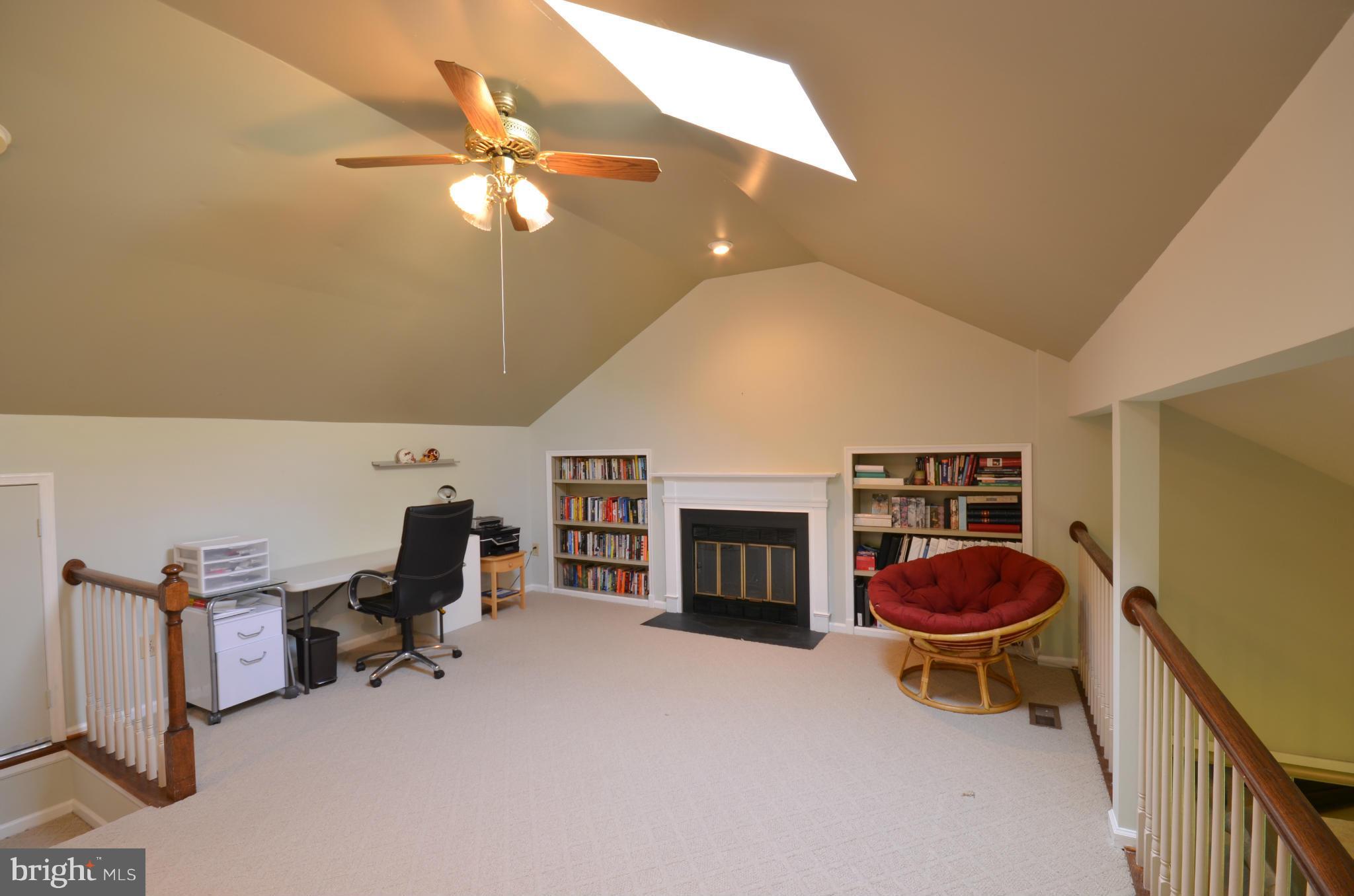 10771 Brewer House Road Rockville, MD 20852 - Photo 17 of 30 a view of a livingroom with workspace and a window