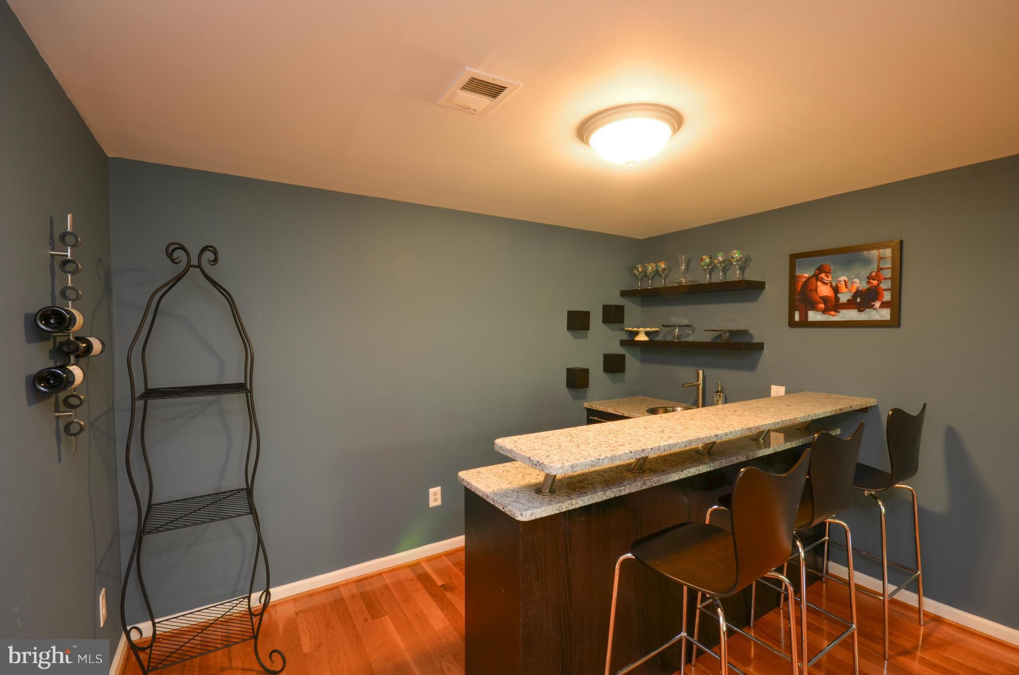 10771 Brewer House Road Rockville, MD 20852 - Photo 21 of 30 a room with furniture and window