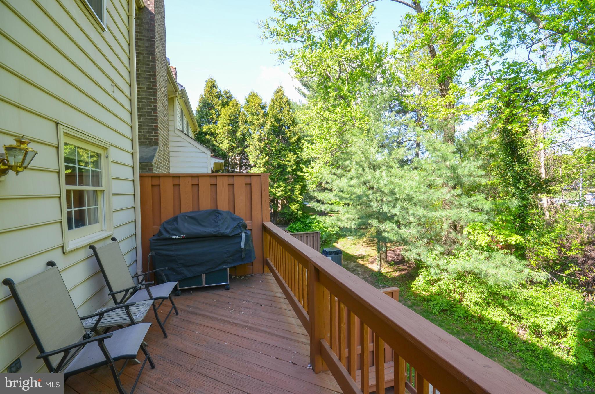 10771 Brewer House Road Rockville, MD 20852 - Photo 30 of 30 a view of balcony with wooden floor and bench