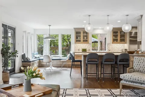 a spacious bedroom with a large bed and a window