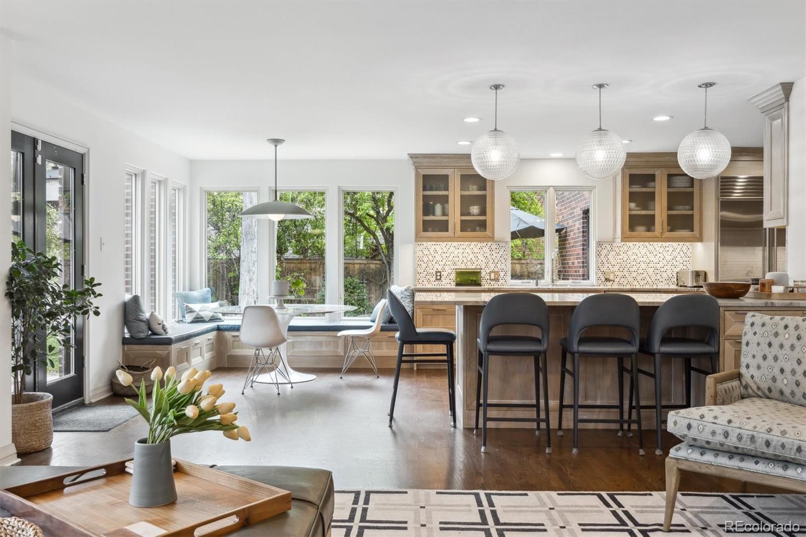 10 Cherry Street Denver, CO 80220 - Photo 16 of 34 a living room with fireplace furniture and a large window