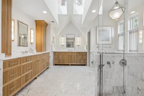 a living room with furniture a window and a table