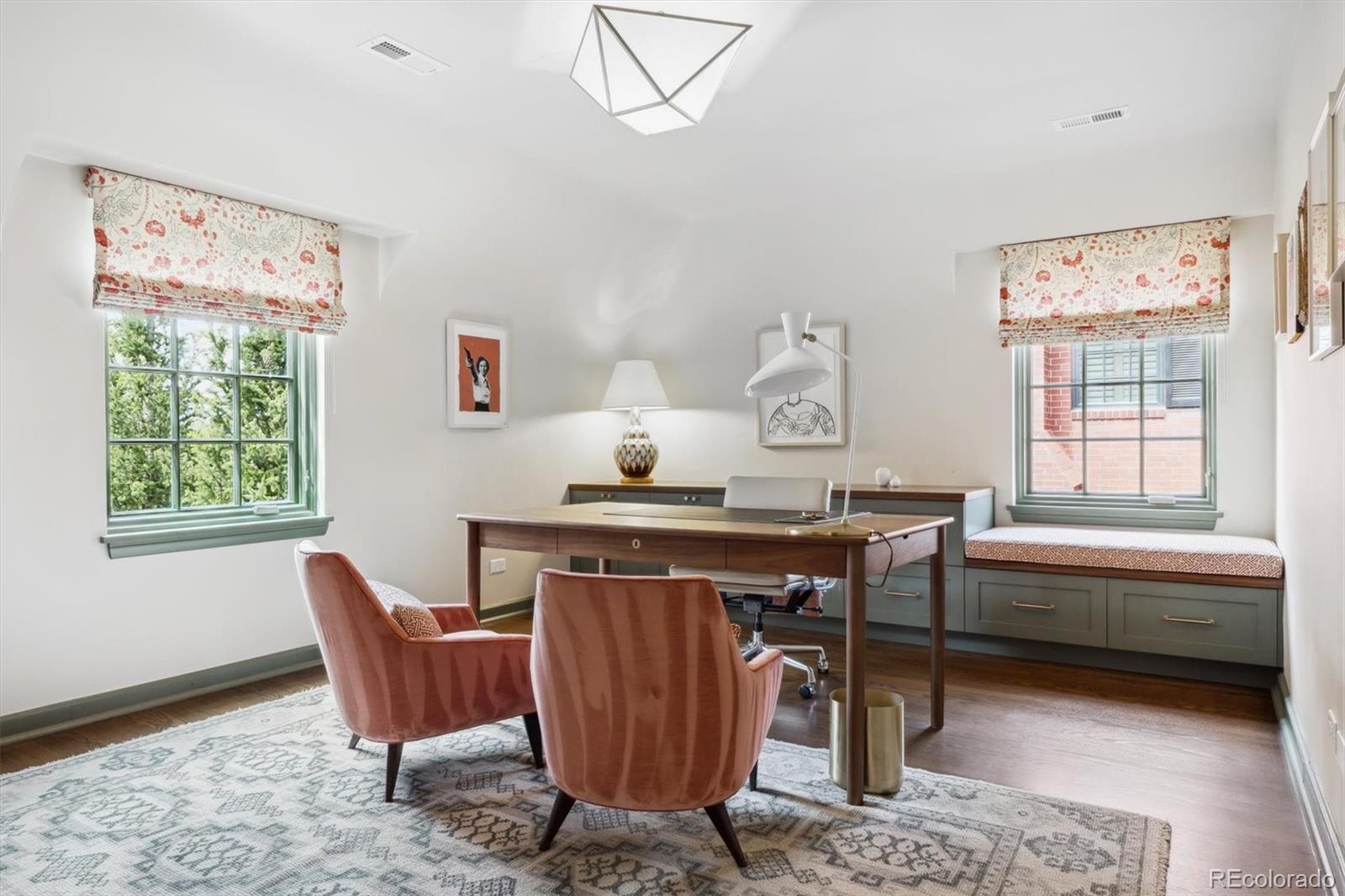 10 Cherry Street Denver, CO 80220 - Photo 26 of 34 a living room with furniture a window and a table