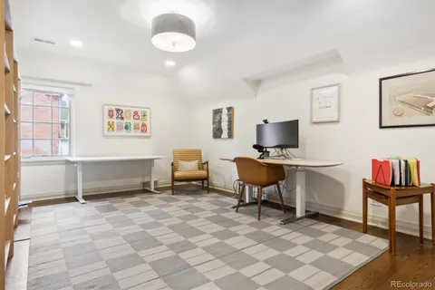 a view of a house with a yard porch and sitting area