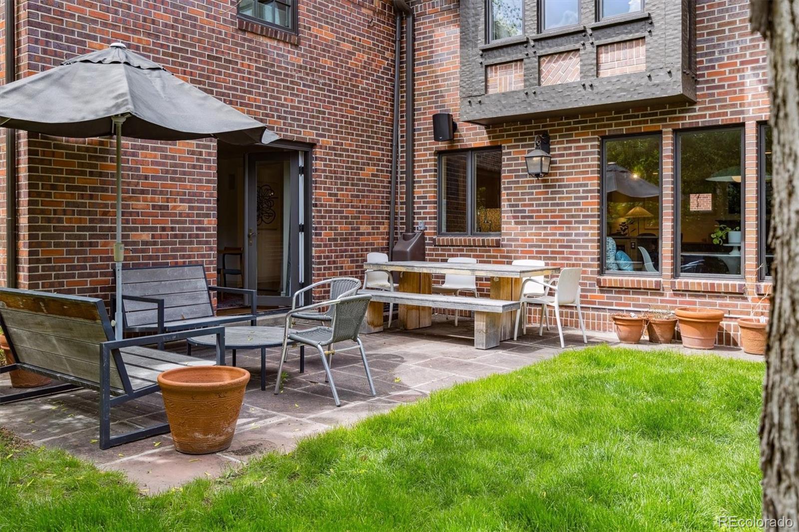 10 Cherry Street Denver, CO 80220 - Photo 31 of 34 a view of a lounge chairs in back yard of the house