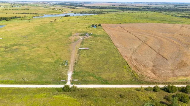 a view of a swimming pool and an outdoor space