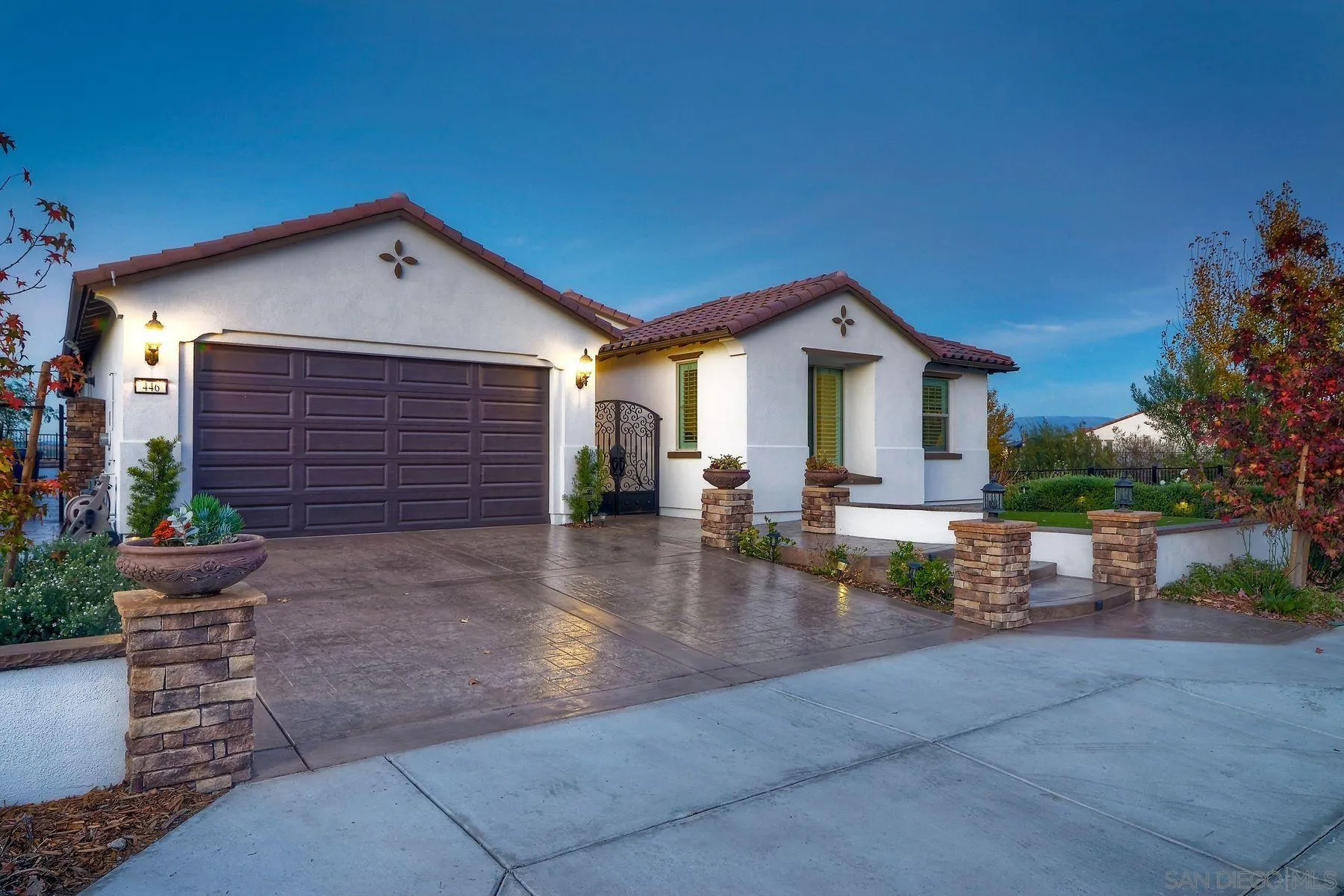 446 Adobe Estates Drive Vista, CA 92083 - Photo 15 of 15 a view of a house with sitting area and potted plants