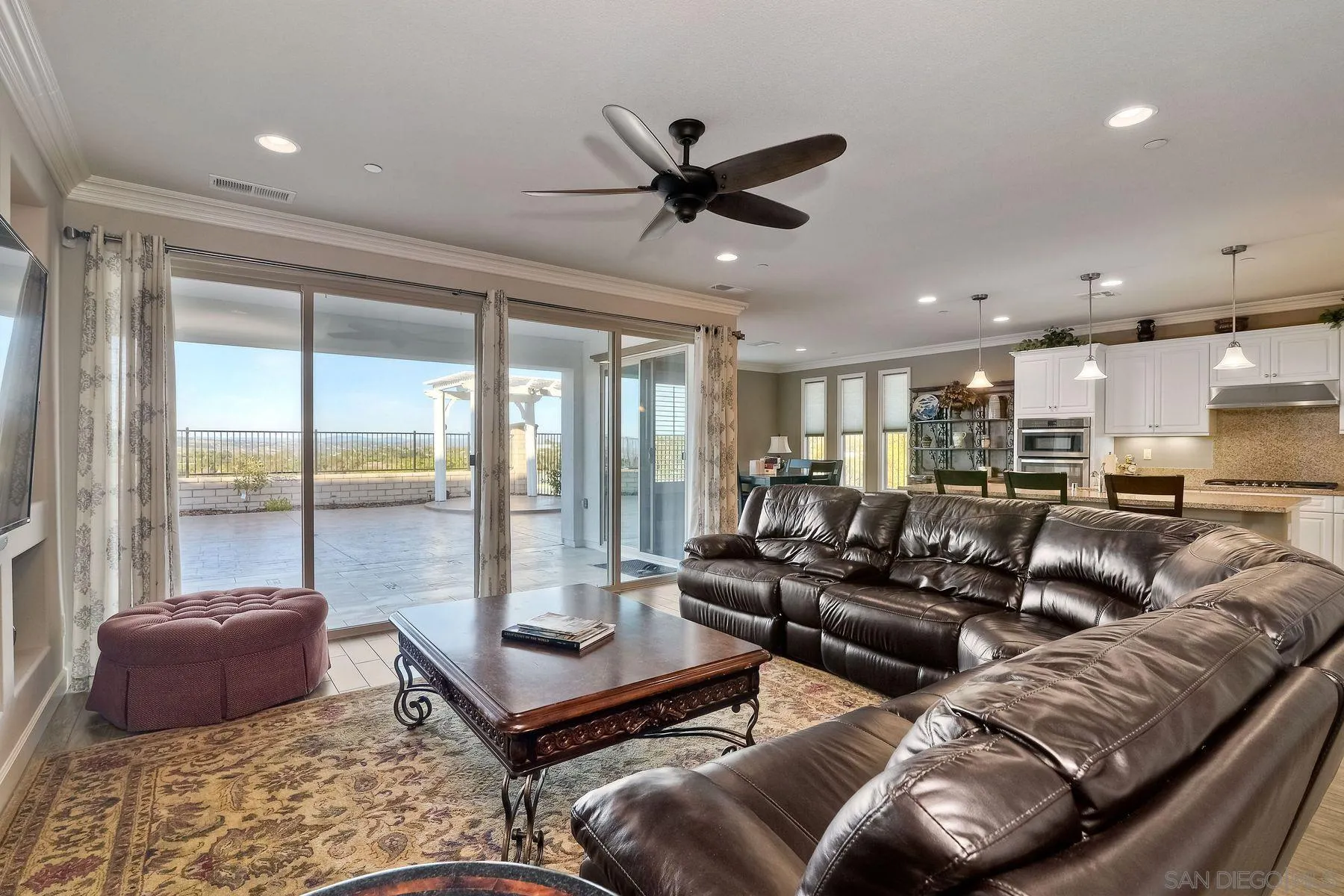 446 Adobe Estates Drive Vista, CA 92083 - Photo 2 of 15 a living room with furniture and a large window