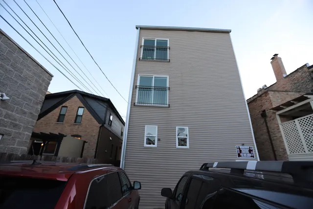 a front view of a house with outdoor space