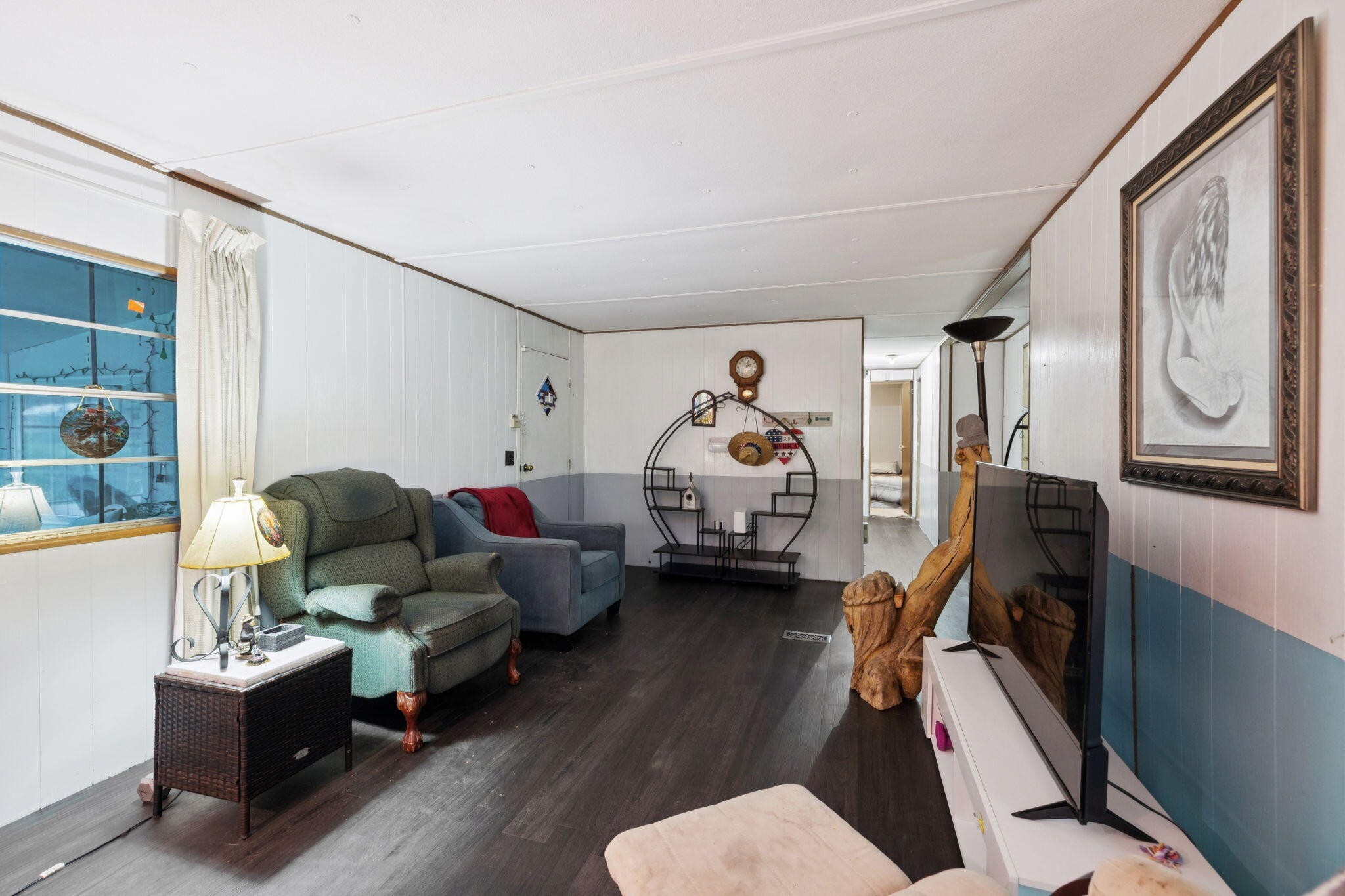 7503 Davis Mill Road Harrison, TN 37341 - Photo 11 of 33 a living room with furniture stairs and a window