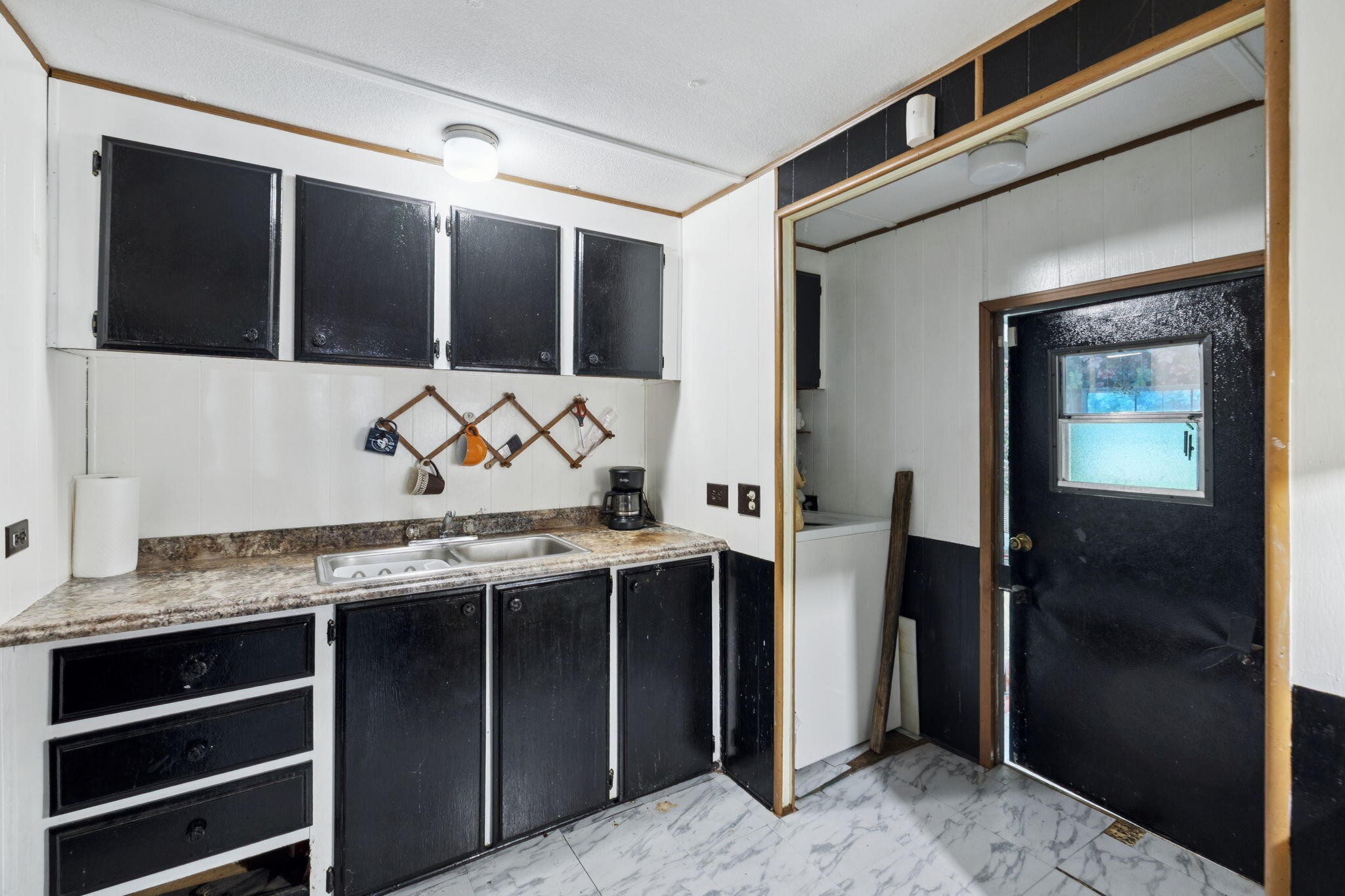 7503 Davis Mill Road Harrison, TN 37341 - Photo 17 of 33 a view of a bathroom with a sink and mirror