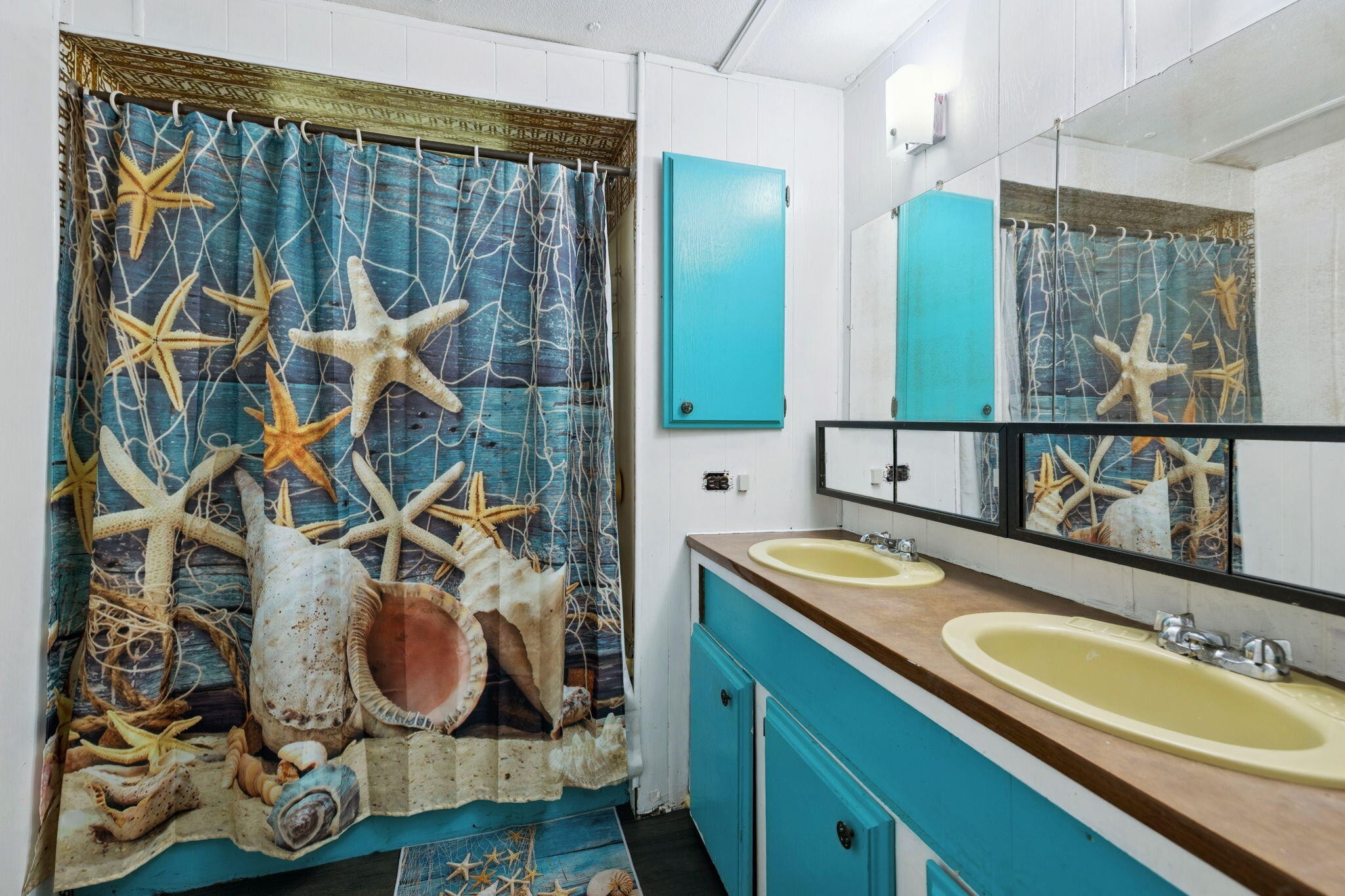 7503 Davis Mill Road Harrison, TN 37341 - Photo 19 of 33 a bathroom with a sink and a mirror
