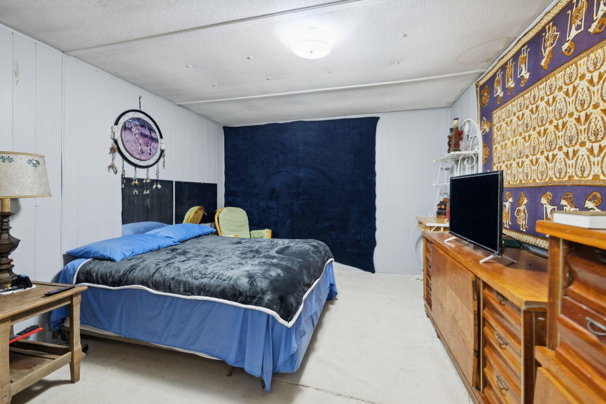 7503 Davis Mill Road Harrison, TN 37341 - Photo 22 of 33 a bedroom with a bed and a flat screen tv