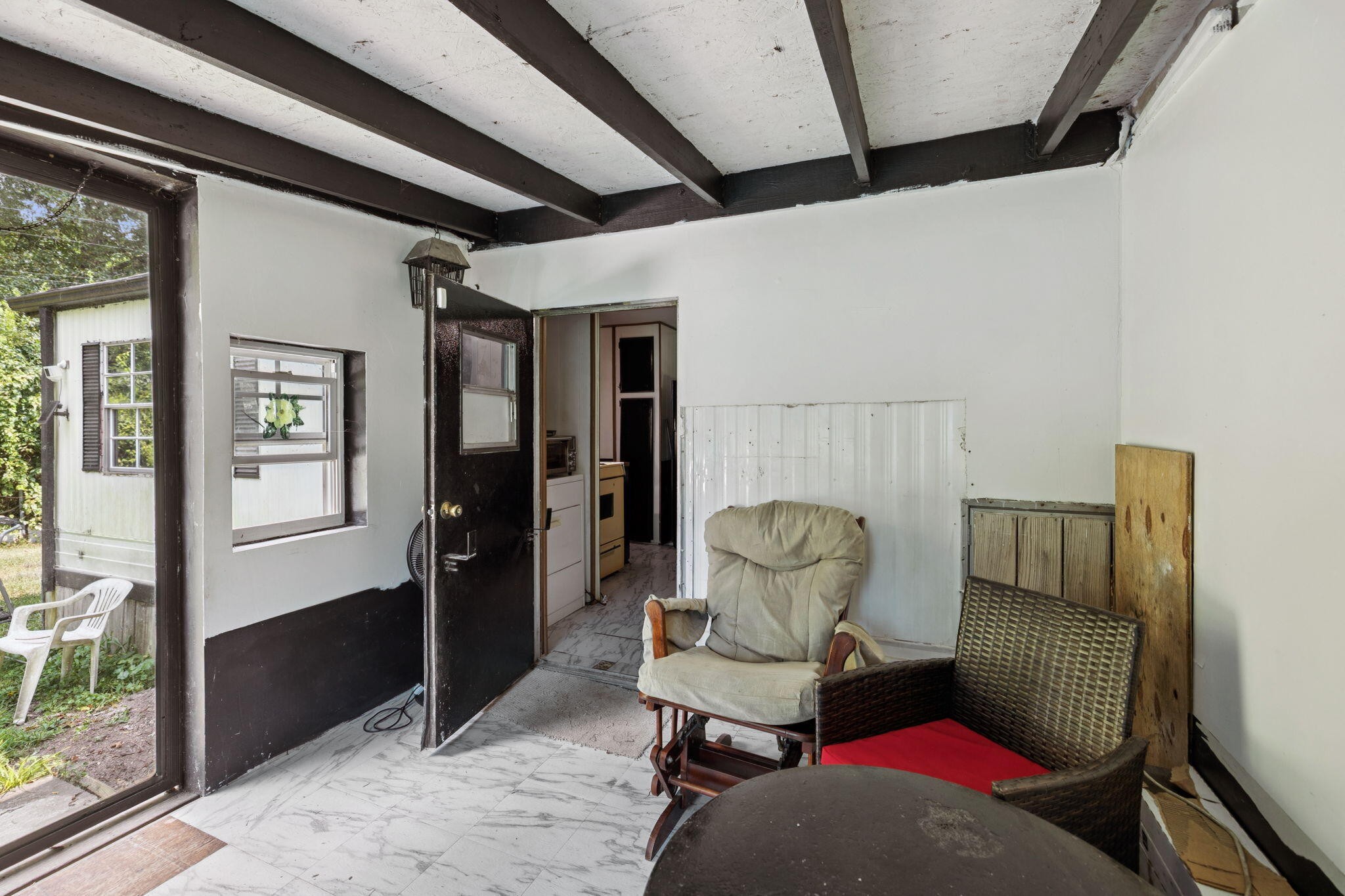 7503 Davis Mill Road Harrison, TN 37341 - Photo 26 of 33 a living room with furniture and a chair
