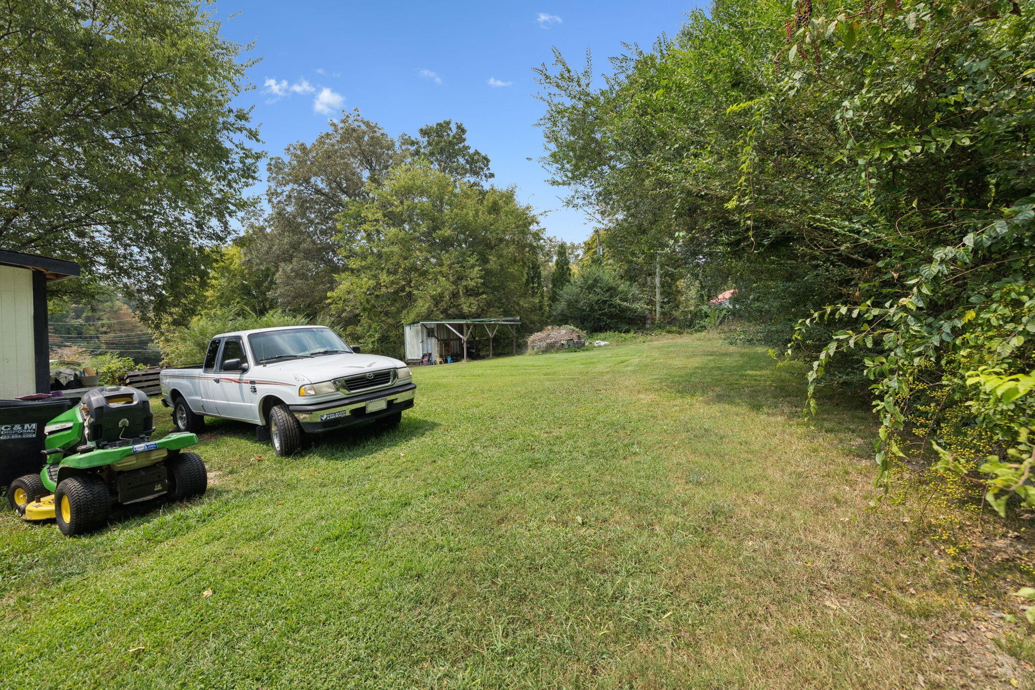 7503 Davis Mill Road Harrison, TN 37341 - Photo 29 of 33 a view of a backyard with parked car