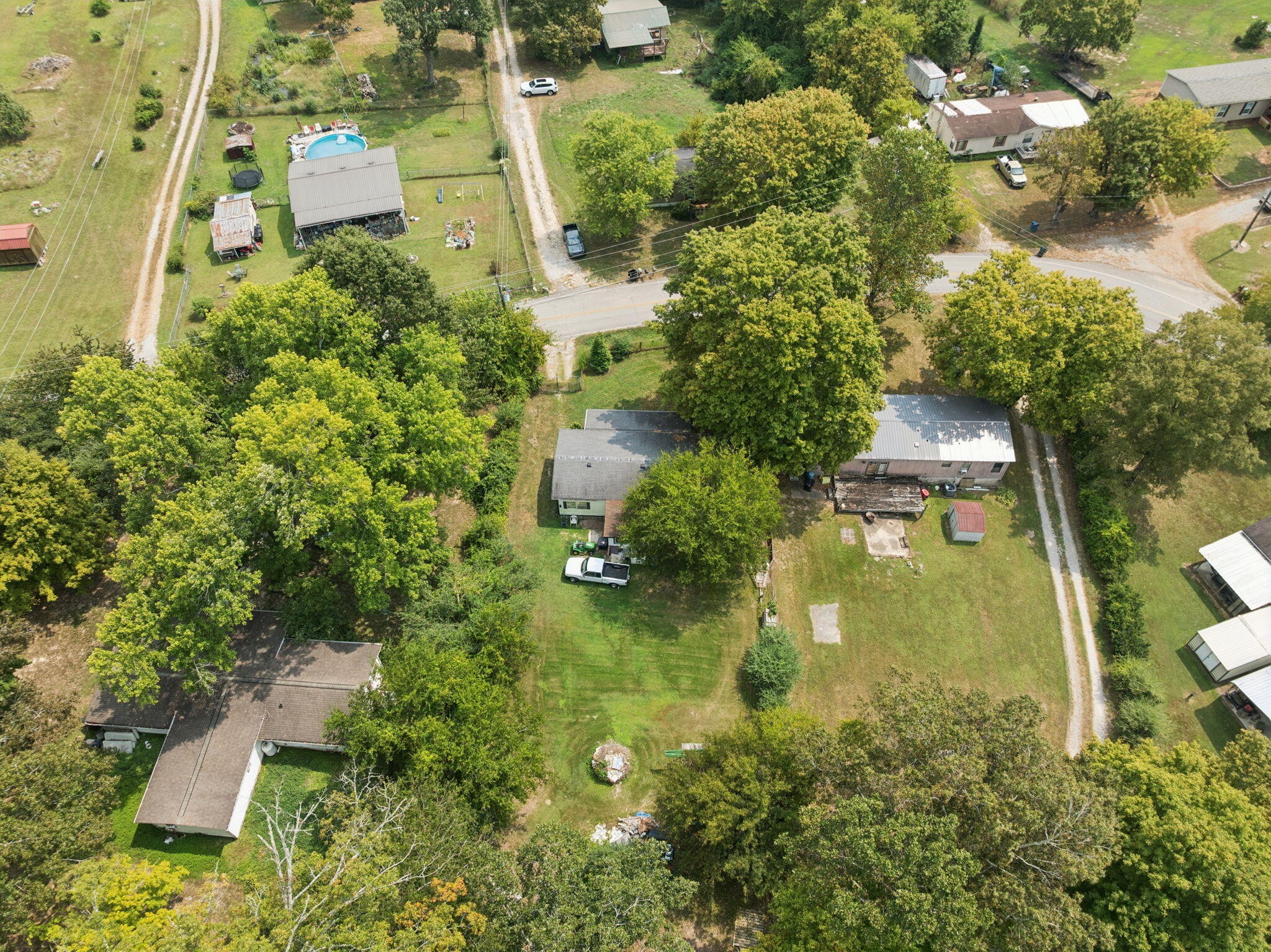 7503 Davis Mill Road Harrison, TN 37341 - Photo 33 of 33 an aerial view of residential house with outdoor space and trees all around