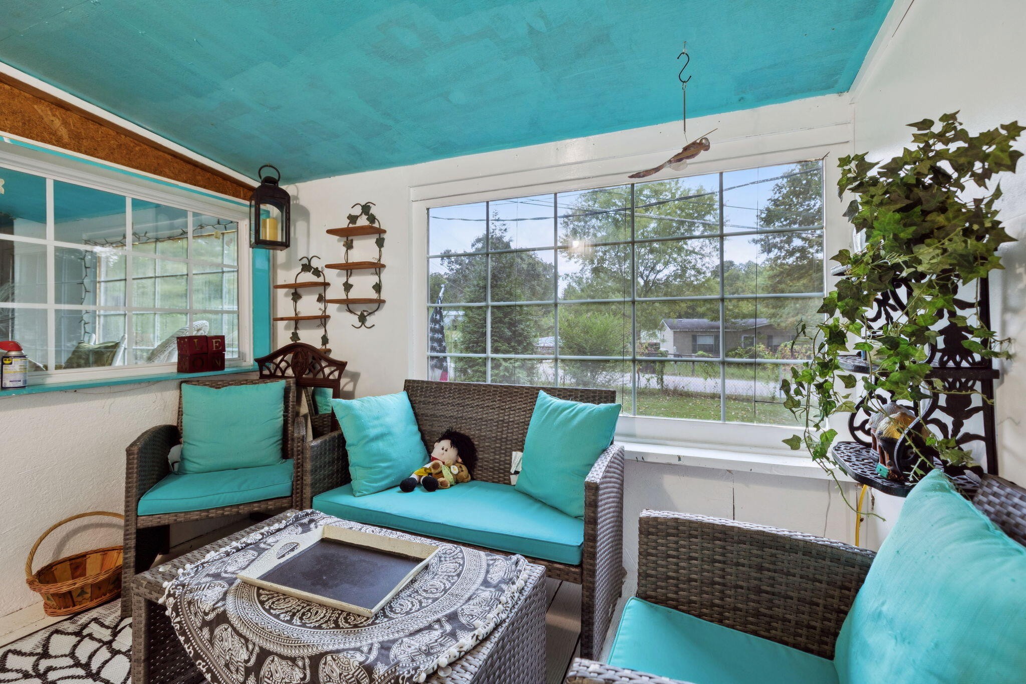 7503 Davis Mill Road Harrison, TN 37341 - Photo 6 of 33 a outdoor living space with furniture and a potted plant