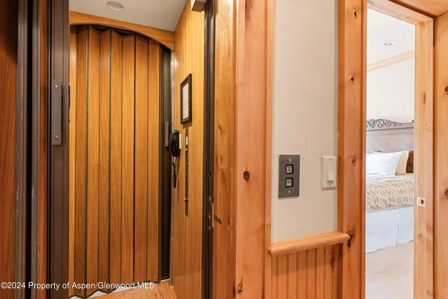 a view of a bathroom with a shower and a window
