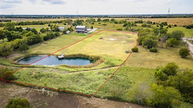 a view of a swimming pool with an ocean view