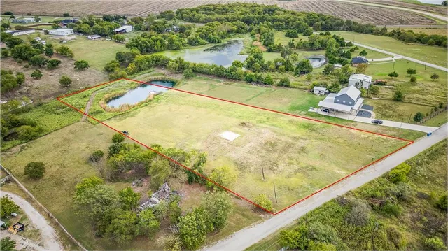 a view of swimming pool from a balcony