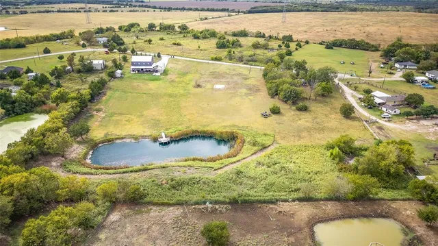 a view of a swimming pool with a lake